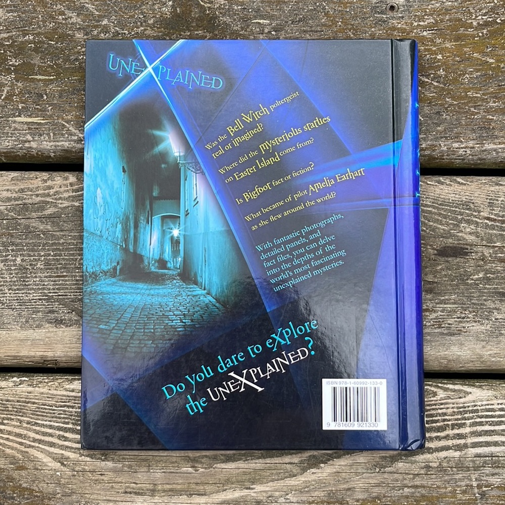 Unexplained Hardcover Book - Picture 2 of 2